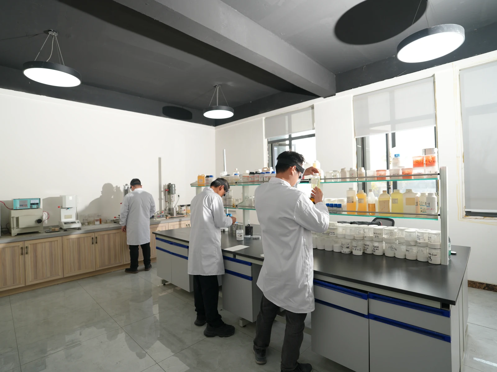 R&D laboratory staff testing materials