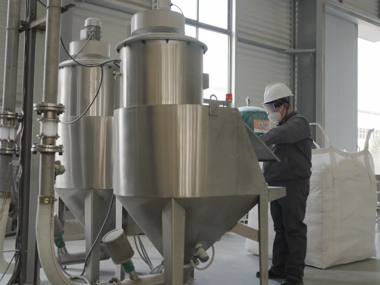 Production operator handling raw materials